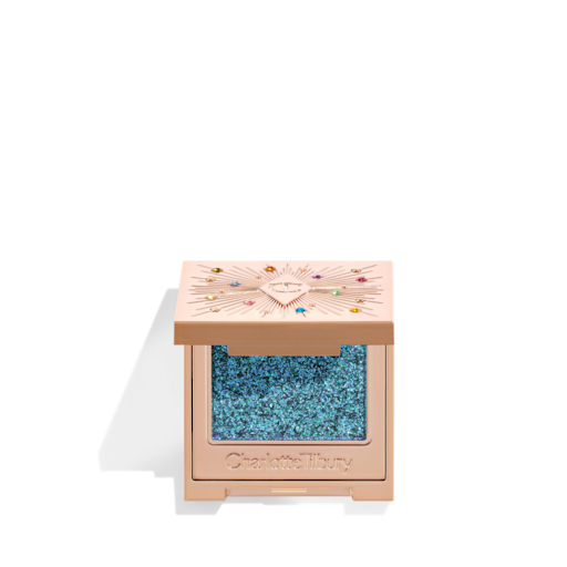 Hypnotising Pop Shot in Cosmic Rock open An open, single-pan eyeshadow with a mirrored lid in an iridescent duo-chrome purple and teal shade with very fine shimmer.