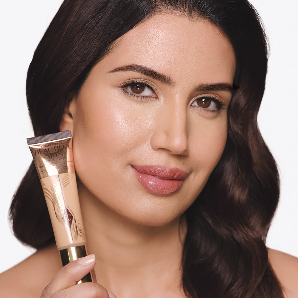 Beautiful Skin model shot Model wearing Charlotte's Beautiful Skin Foundation for a minimal makeup look
