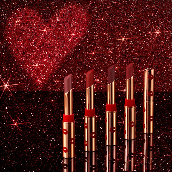 Limitless Lucky Lips collection banner A collection of five, open, 5 universally-flattering red-toned lipsticks with a matte finish, in gold-coloured tubes with a playful, kiss-print pattern.