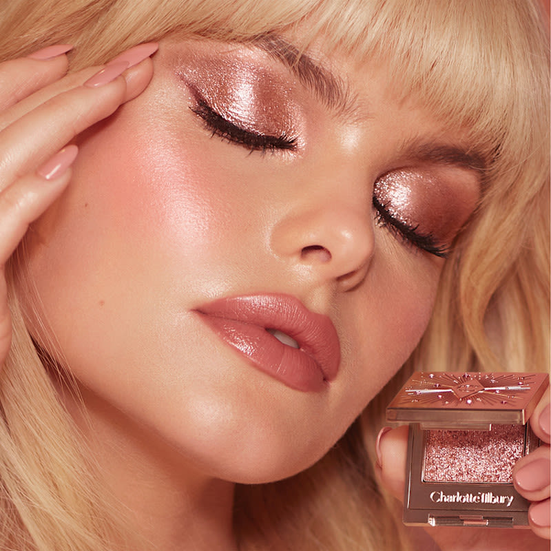 Pink Glitter Eyeshadow Look Model wearing a pink glitter eyeshadow makeup look using Pillow Talk Diamonds Hypnotising Pop Shot