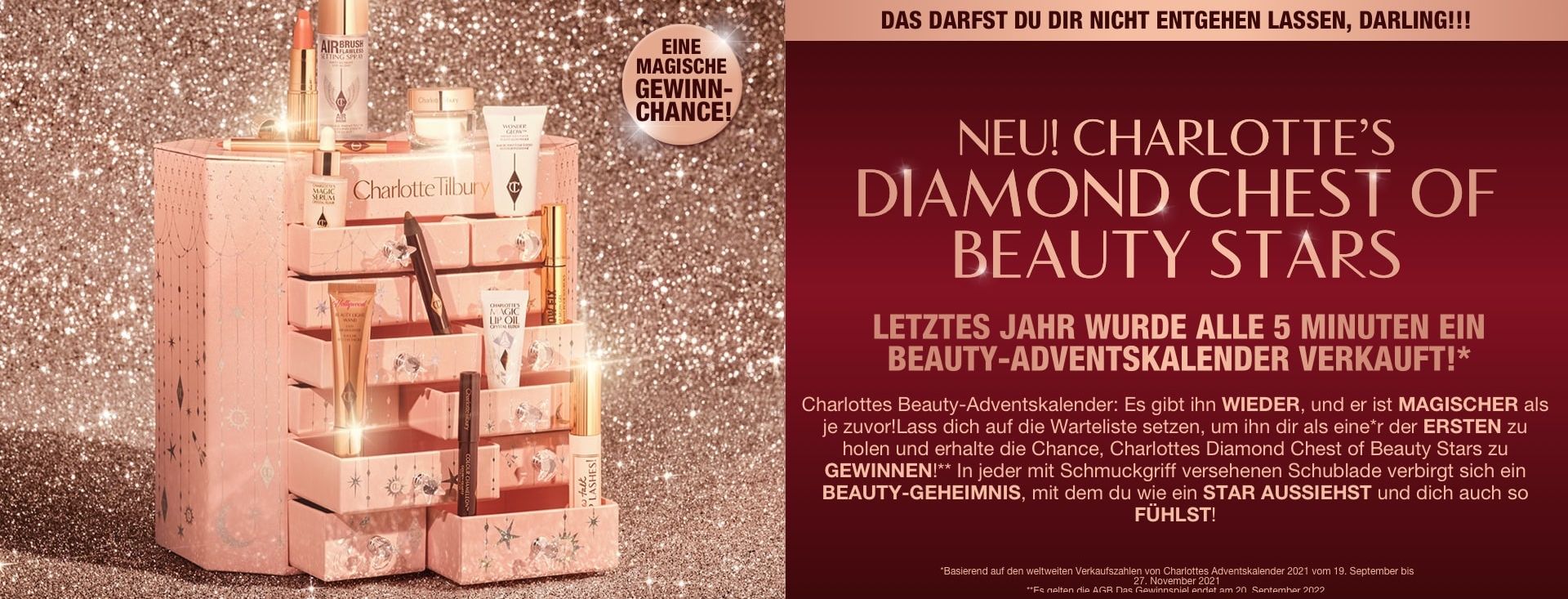 DE HOLIDAY22-ADVENT-CONTENT-HERO-MB A pink-coloured chest of drawers with a clay mask, nude pink matte lipstick, nude pink lip liner, eyeliner pencil in dark copper, black-coloured mascara, liquid primer, champagne-coloured liquid highlighter, dark brown eyeliner pencil, pearly-white face cream, luminous ivory-coloured serum, and bronze-coloured body highlighter., and text that reads, 'A magical chance to win!'