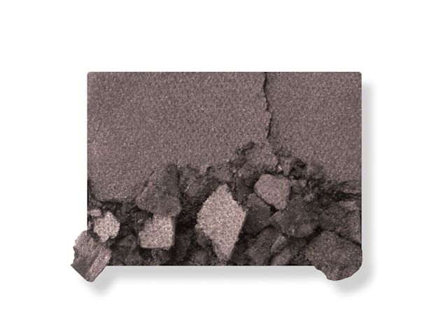 Luxury Palette The Rock Chick Smoke shade swatch Swatch of a powder eyeshadow in a deep charcoal-grey colour.