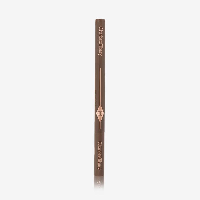 Brow Lift in Medium Brown closed A closed, double-ended eyebrow pencil and spoolie brush duo in medium-brown-coloured packaging
