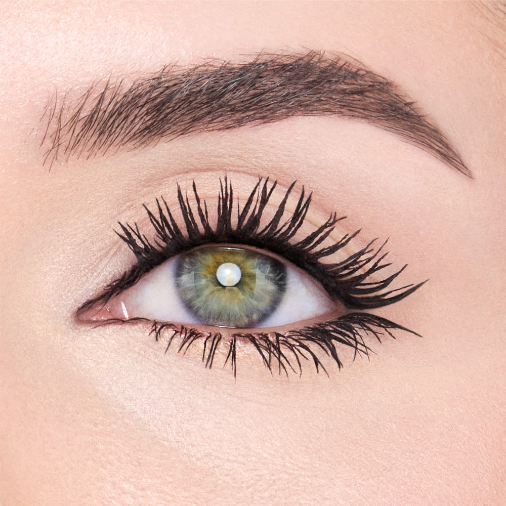 How to apply mascara for volume Model close up wearing Exagger-Eyes Volume Mascara for volumised lashes