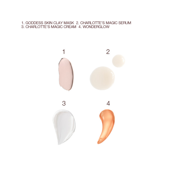 Swatches of a clay mask, luminous ivory-coloured serum, pearly-white face cream, and glowy copper-gold-coloured primer. 