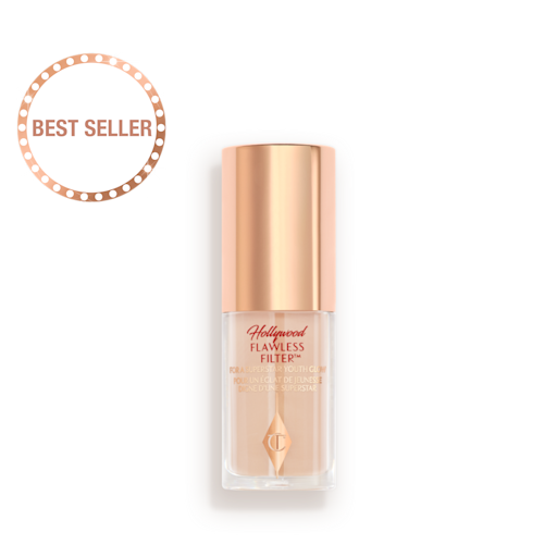 Mini Hollywood Flawless Filter in shade 2 closed A closed glow-boosting primer in a glass bottle with a rose gold-coloured lid.