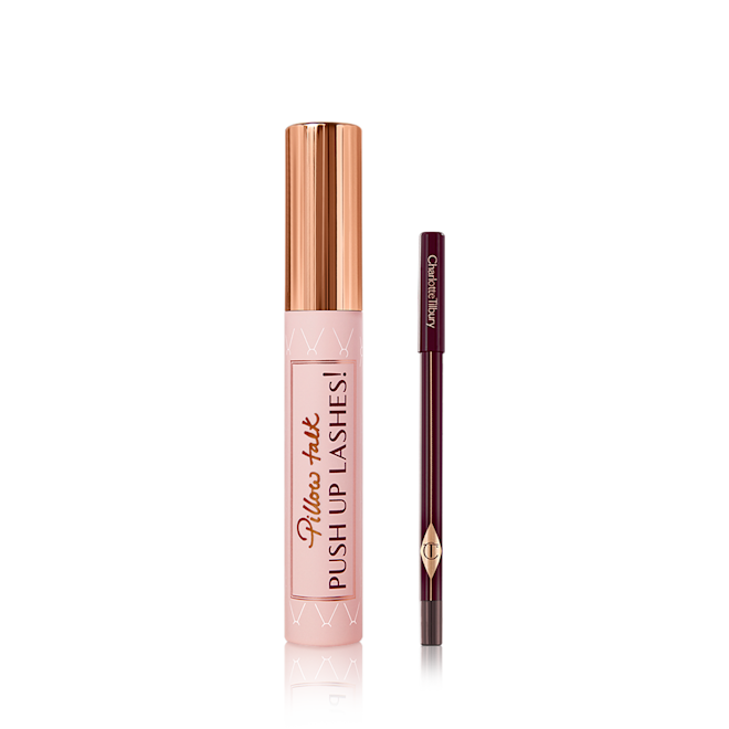 Pillow Talk Push Up Eye Secrets Kit displayed Mascara in a nude pink tube with a gold-coloured lid with Pillow Talk push up lashes! written on the tube along with an eyeliner pencil in a dark berry-brown shade.