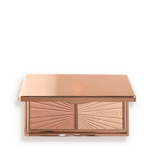 Filmstar Bronze and Glow open An open, mirrored-lid duo contour palette for light to medium skin tones in sleek rose-gold-coloured packaging.