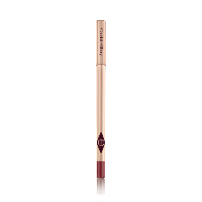 A lip liner pencil in a bold red shade with gold-coloured packaging. 