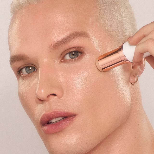 Daniel stick foundation application Daniel applying stick foundation to their cheekbone