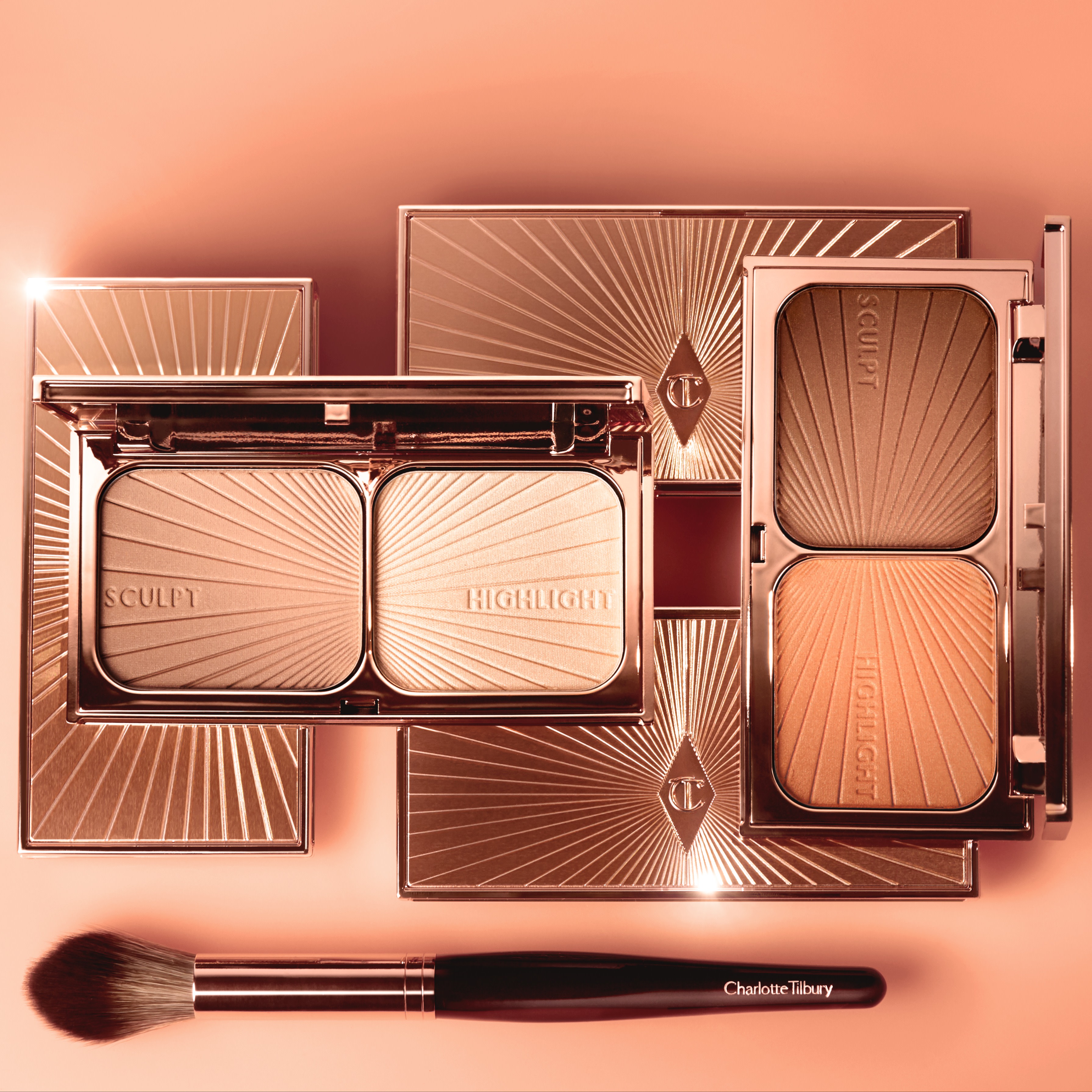 A collection duo contouring palette with a bronzer and highlighter powder for fair to medium skin tones and medium to dark skin tones in a sleek, gold-coloured compact. 