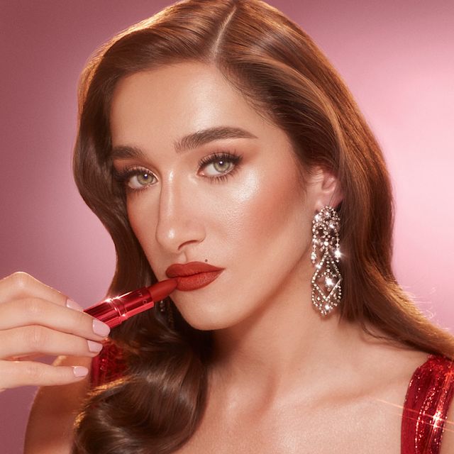 Matte Red Lipstick model shot Bella Tilbury wearing Fame Flame matte red lipstick