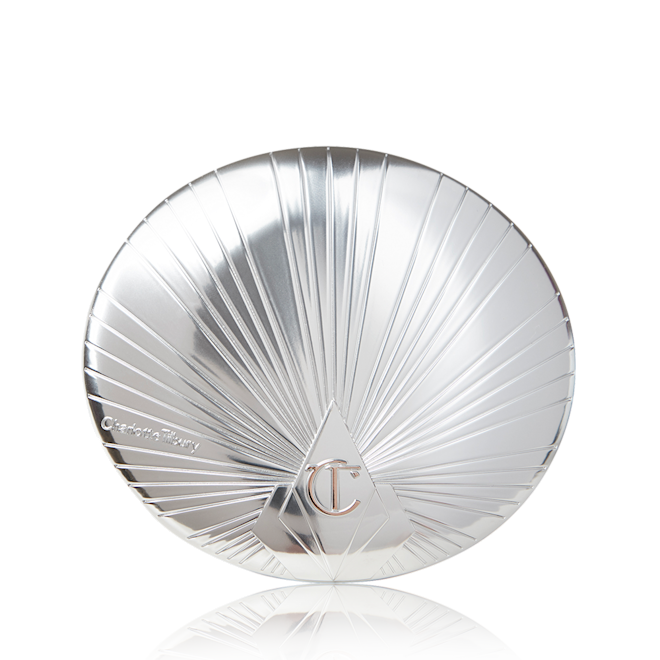 Hollywood Superstar Glow Highlighter closed A closed highlighter compact with a silver coloured lid with the CT logo embossed on it.