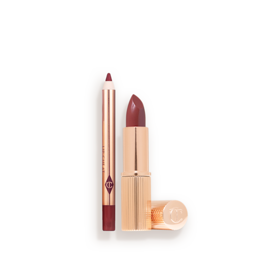 Travel Size Pillow Talk Intense Kit open An open mini lipstick in a deep berry-rose pink colour with its lid next to it and a mini lip liner pencil in a matching shade.