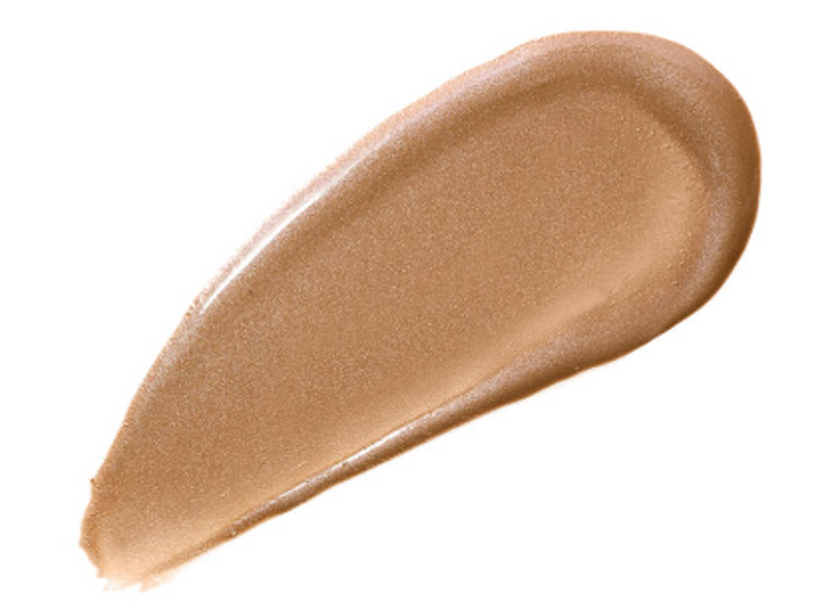 Hollywood Contour Wand swatch Swatch of a liquid contour wand in a shimmery, sandy brown colour.