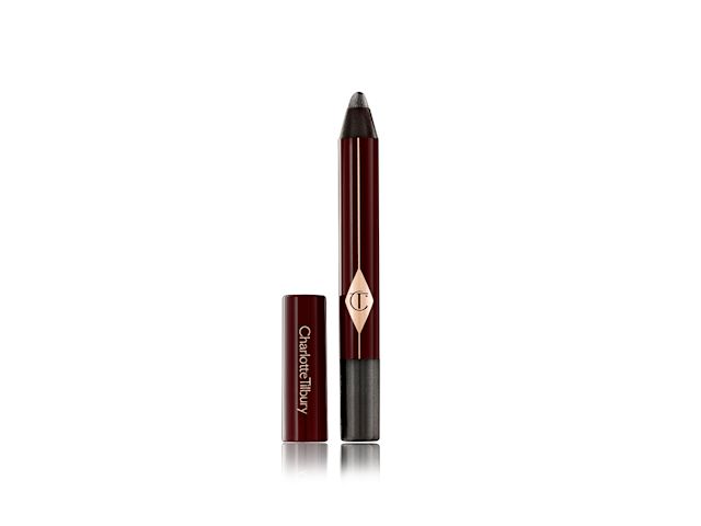 Colour Chameleon eyeshadow pencil in Black Diamonds An open, chubby eyeshadow pencil in a shimmery black shade with its lid next to it.
