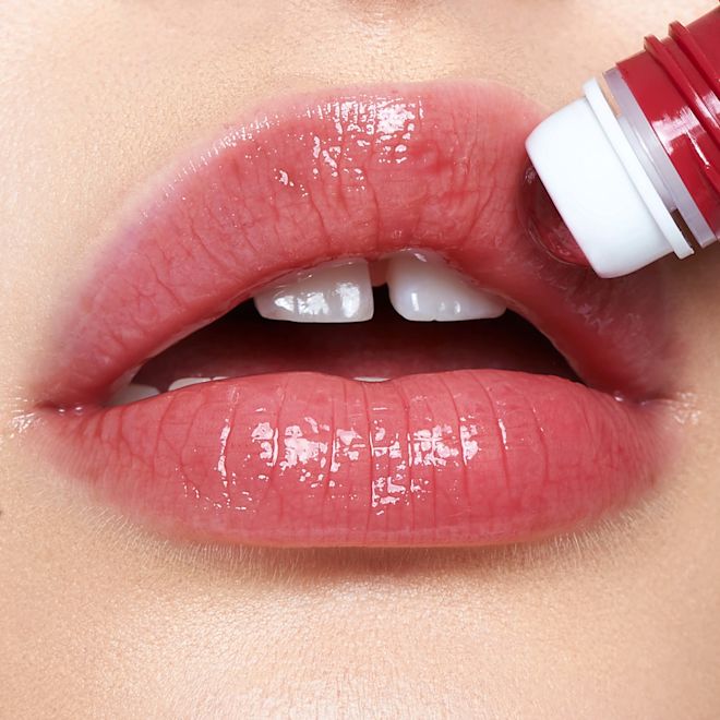 Lip Oil in Berry Bliss on fair model lips close-up Lip Oil in Berry Bliss on fair model lips close-up