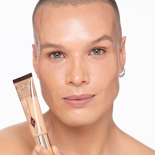 Beautiful Skin foundation in 6C on light-tone model Light-tone male model wearing glowy, skin-like foundation with a fresh, satin finish.