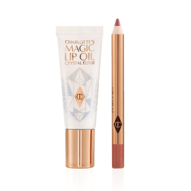 Lip oil in a white-coloured tube with a gold-coloured lid along with a lip liner pencil in a nude pink shade.