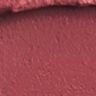 Matte Revolution in Pillow Talk Medium Lipstick swatch Close-up swatch of a matte, berry-pink lipstick.