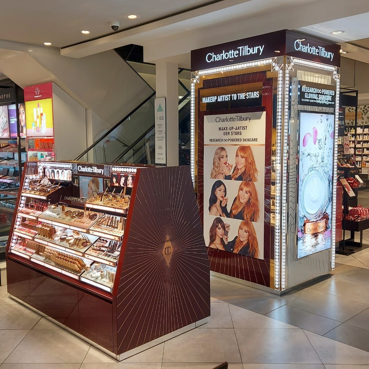 Charlotte Tilbury store with different makeup products and skincare items displayed.