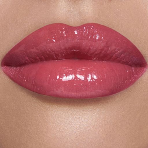 Lip Gloss & Mini Lipstick Kit in 90s Pink on fair model Lip Gloss & Mini Lipstick Kit in 90s Pink on fair model