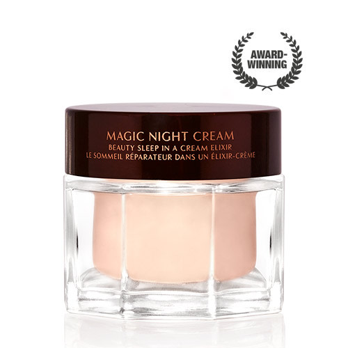 Award-wining, peach-coloured night cream in a large glass jar with a dark brown-coloured lid with Magic Night Cream written on it in gold colour.