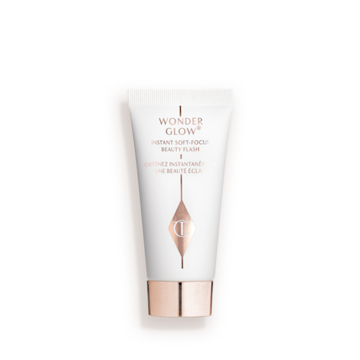 Wonderglow Mini Closed White small bottle with a rose-gold lid.