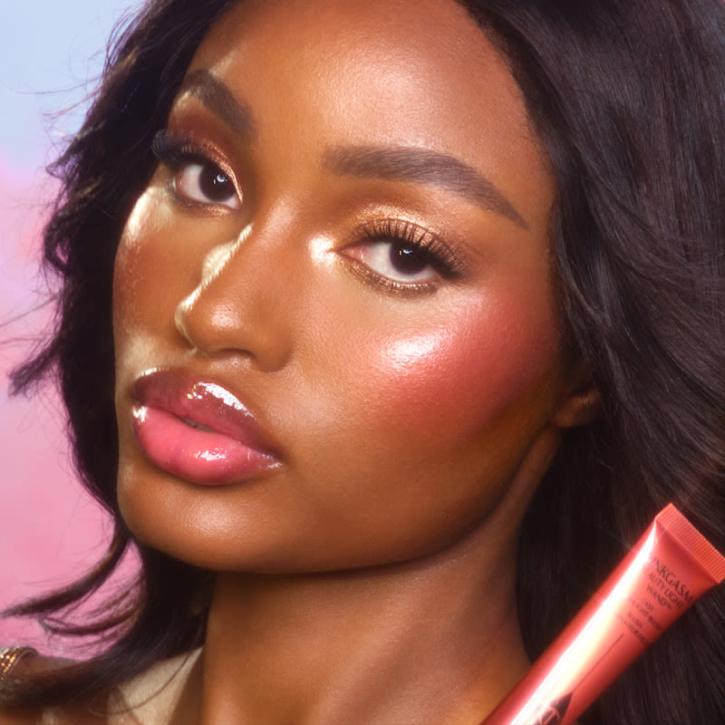 Sunset Blush model shot Model wearing a sunset blush summer blush look created with Pinkgasm Sunset