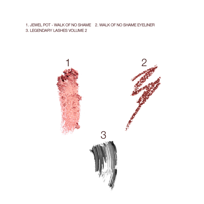 Walk of No Shame Eye Kit 2 swatches Swatches of a cream eyeshadow in a rose gold shade, eyeliner in a berry-pink, and black mascara.