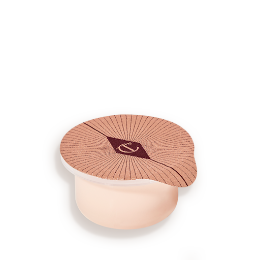 Magic Eye Rescue Refill Refill of a champagne-coloured, thick and luscious eye cream in a petite pot with an easy-to-peel-off cover.