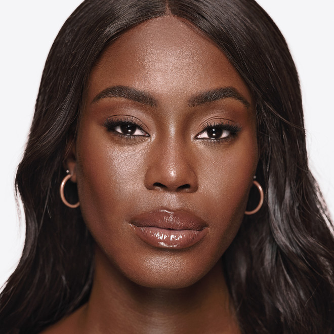 Model wearing Charlotte's Beautiful Skin Foundation for a natural makeup look