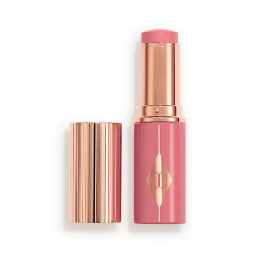 Rosy Glow Open Packshot Muted pink packaging matching to the stick product with a rose gold lid and detailing.