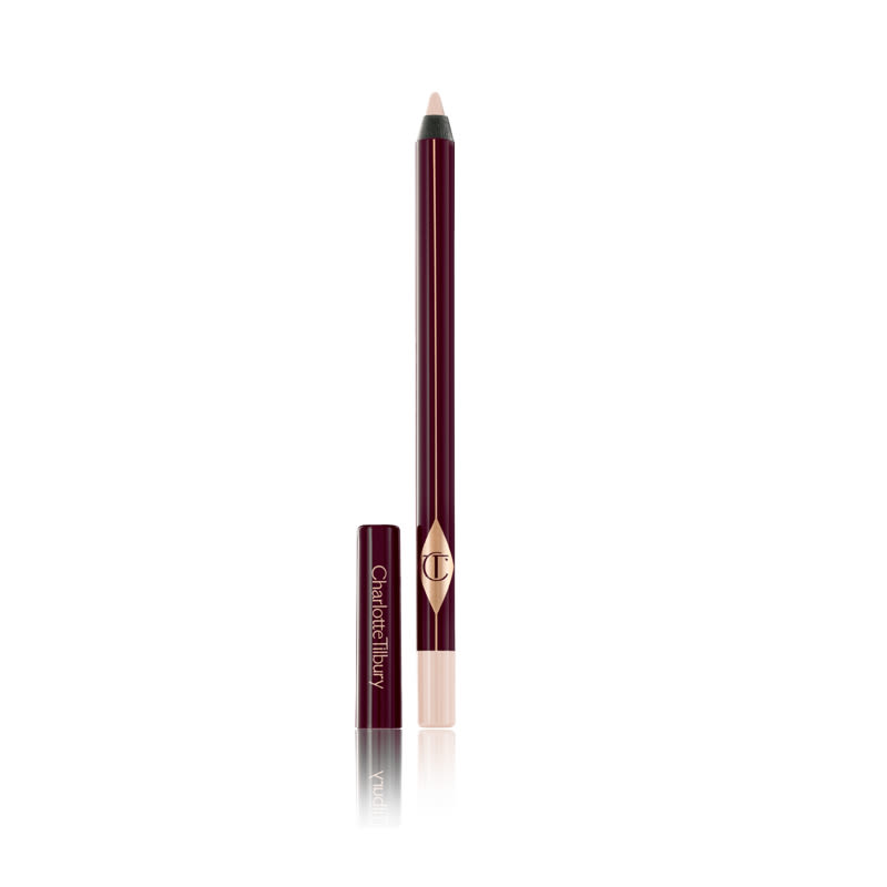 Rock 'N' Kohl eyeliner pencil in Eye Cheat lid off Nude-white brightening kohl liner pencil with its lid next to it.