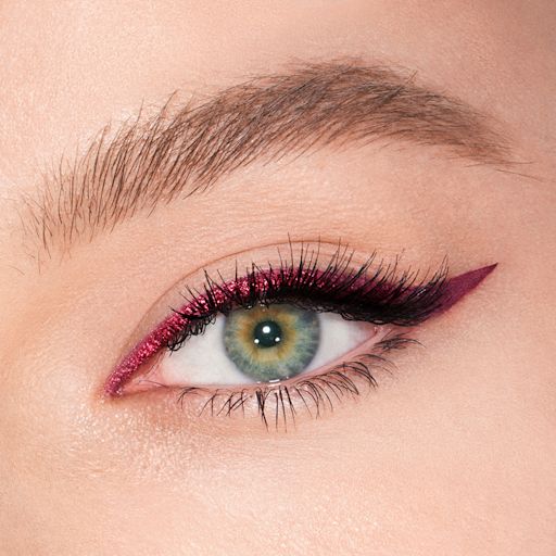Eye Colour Magic Liner Duo in Mesmerizing Maroon eye close-up Fair-tone model with green eyes eye close-up of a sparkly maroon eyeliner with a soft wing in matte purple colour.