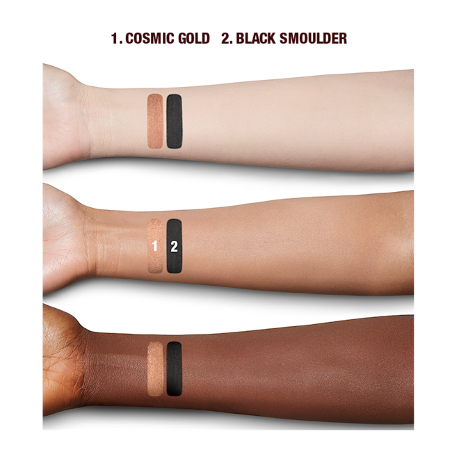Smokey Eyes Dream Lashes Kit arm swatches Deep, fair, and tan-tone arms with swatches of two eyeshadows in brown-gold with a metallic finish and jet black with a matte finish.
