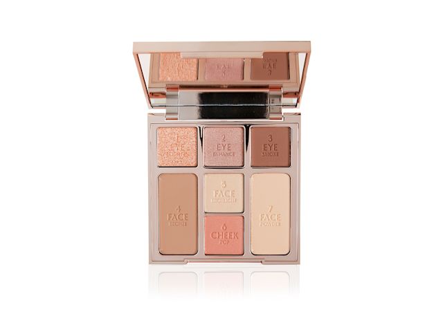Instant Look in a Palette in Pretty, Blushed Beauty open An open, mirrored-lid face palette with nude eyeshadows, nude pink and soft pink blushes, bronzer, and highlighter.