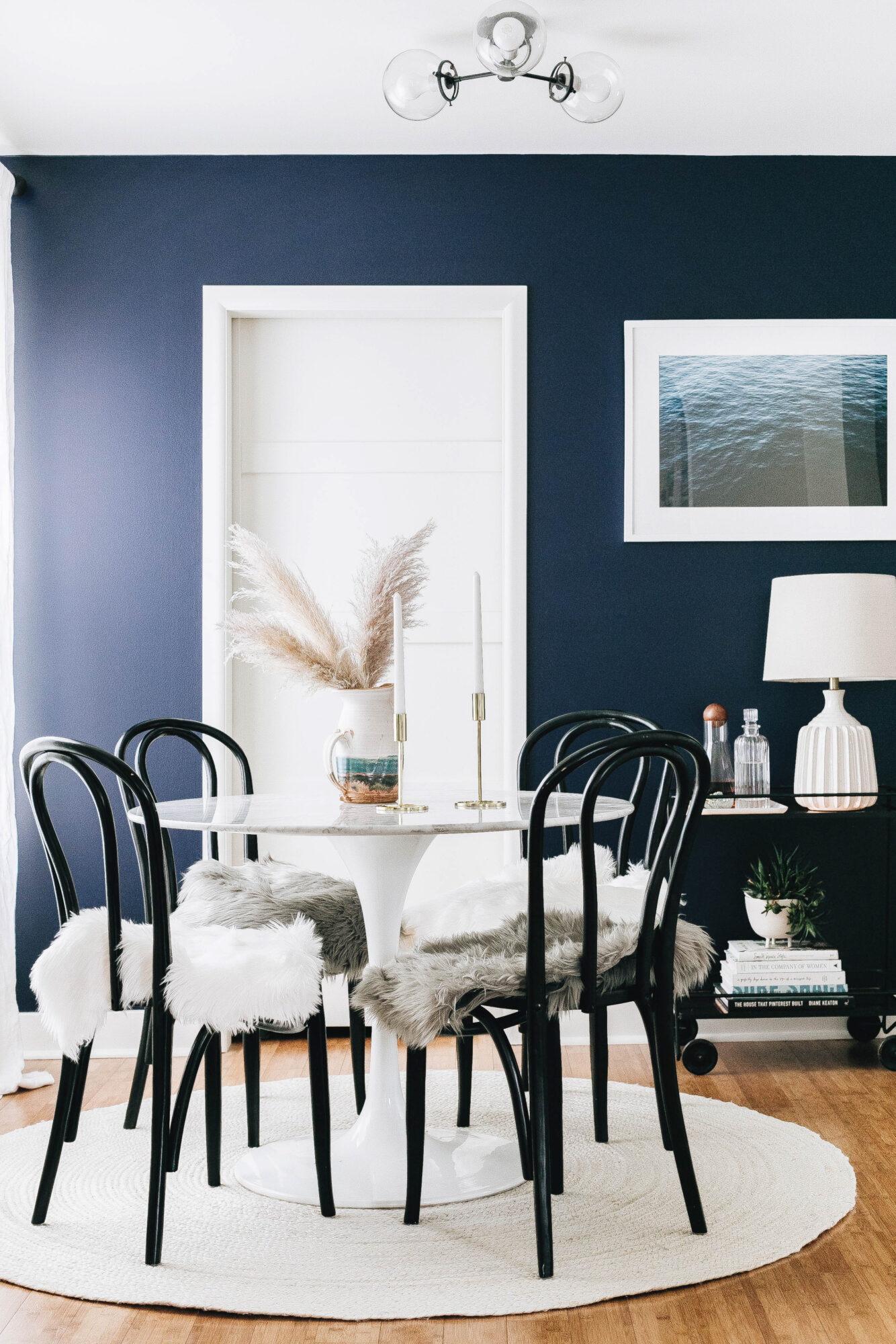 dining room black chairs navy walls