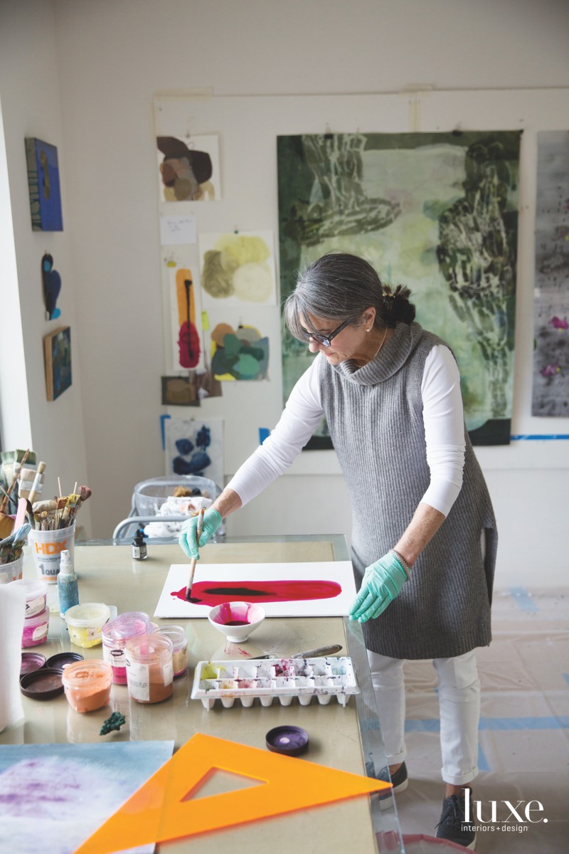 Artist Arienne Lepretre paints daily at a work table in her Dallas studio. Artist Arienne Lepretre paints daily at a work table in her Dallas studio.
