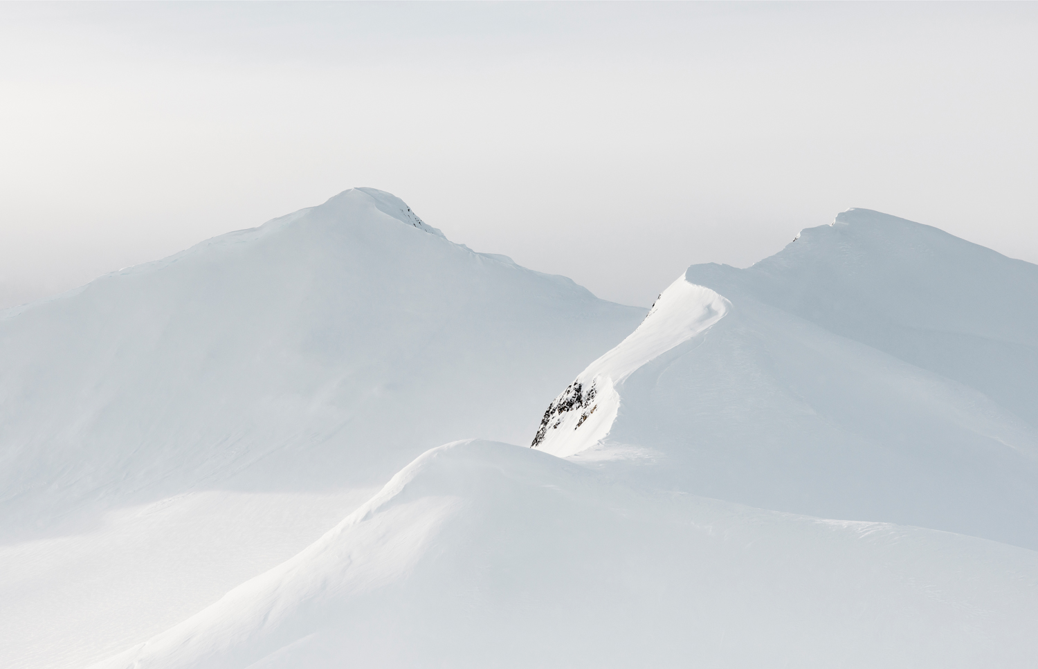 photo of snow-covered mountain peaks by Kate Holstein