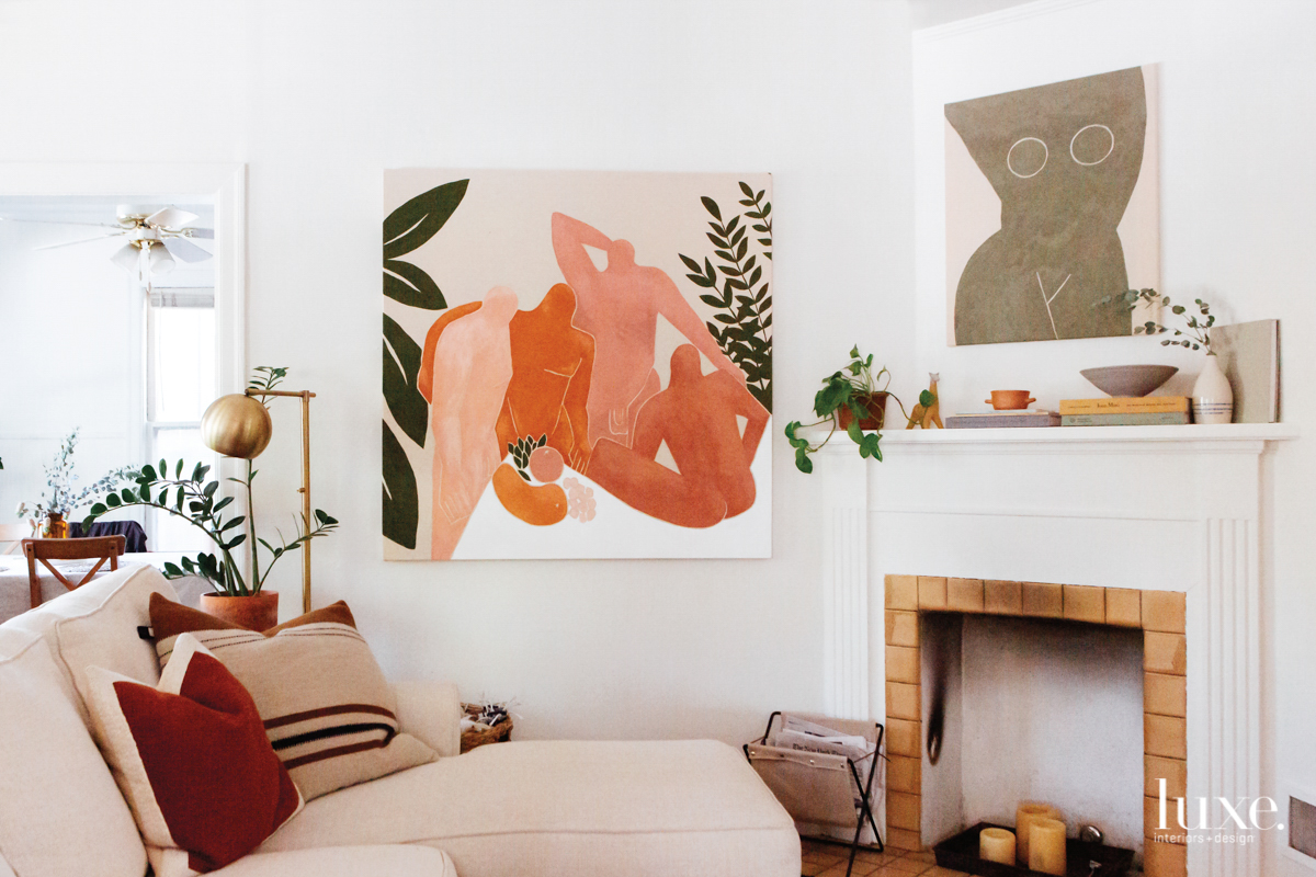 piece of art on a diesel of four people and fruit on a wall in a home