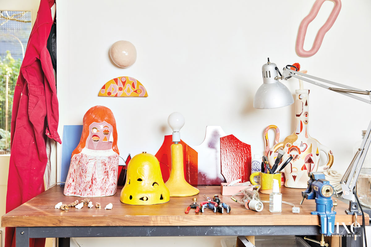 studio work table with ceramic pieces