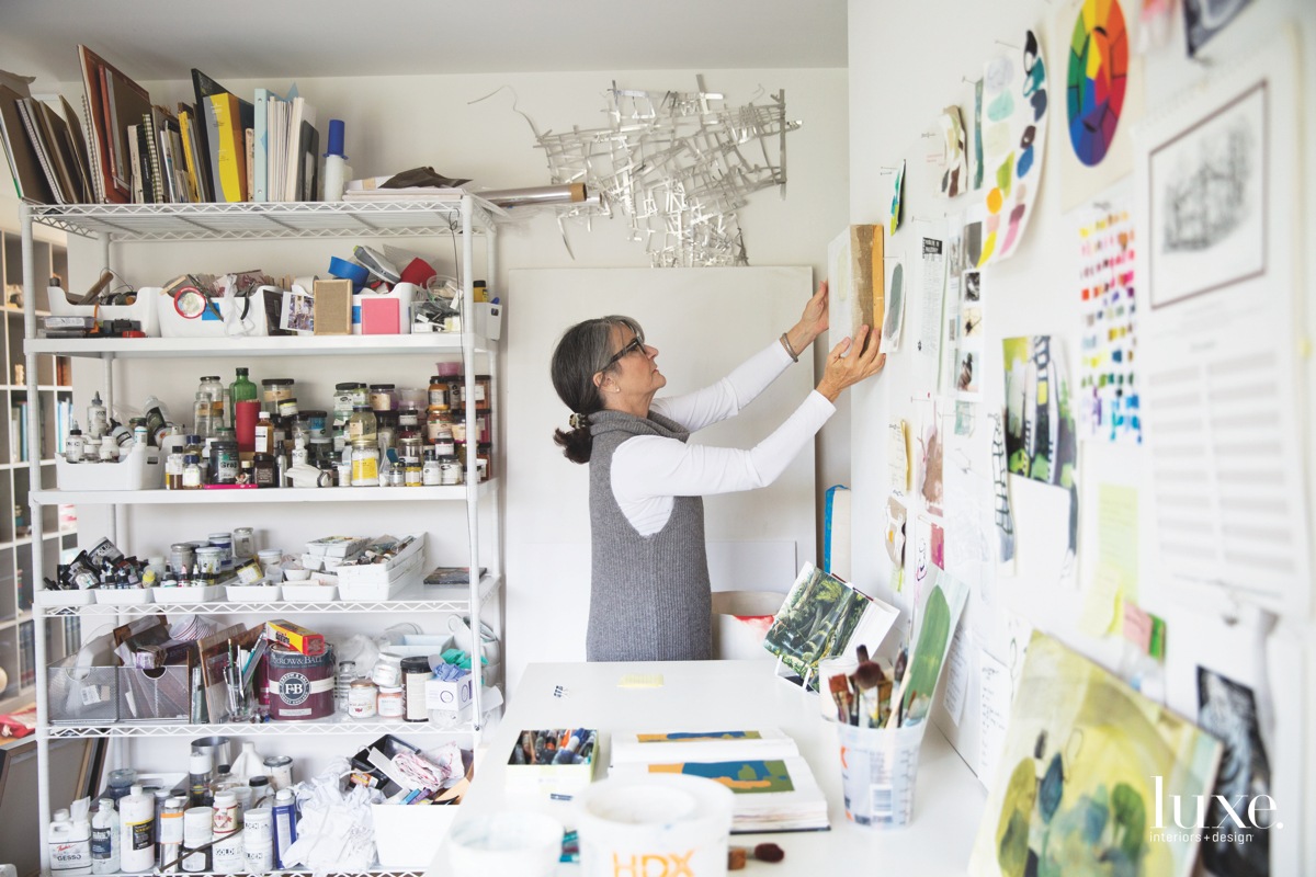 Lepretre describes shelving in her studio--which contains powdered pigments, mediums, tools, tape, acrylics and more--as her "personal candy store."