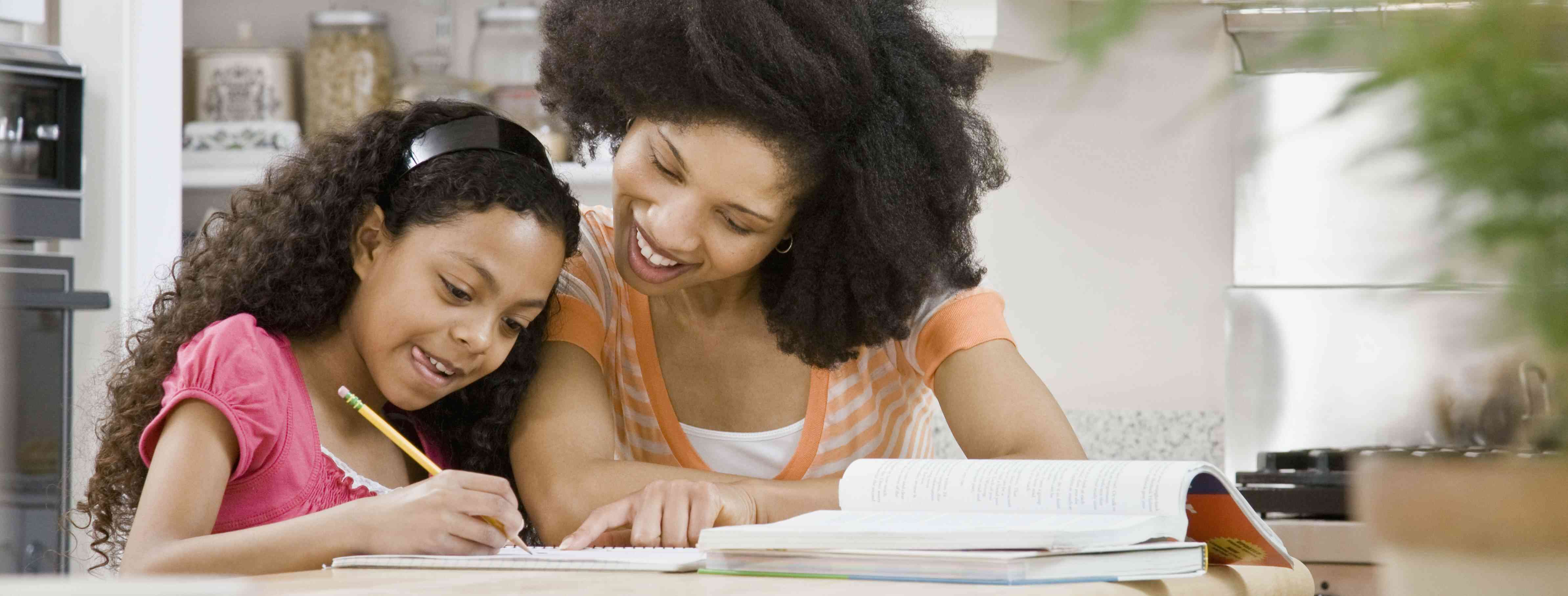 Child receiving help from a babysitting tutor