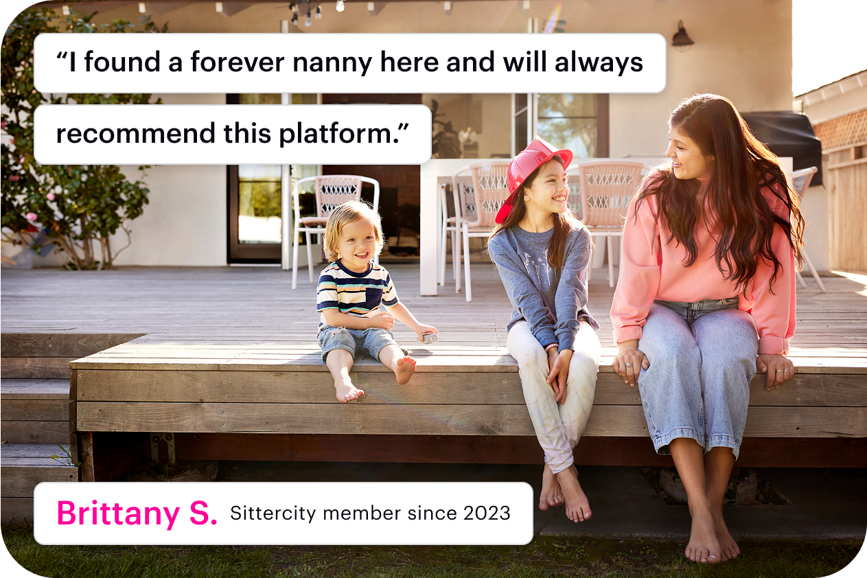 Babysitter sitting on a bench with two children, all smiling