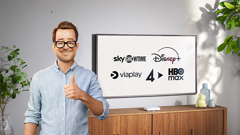 Boxer-Robert gör tummen upp framför en tv-skärm med loggor på streamingtjänster i skärmen