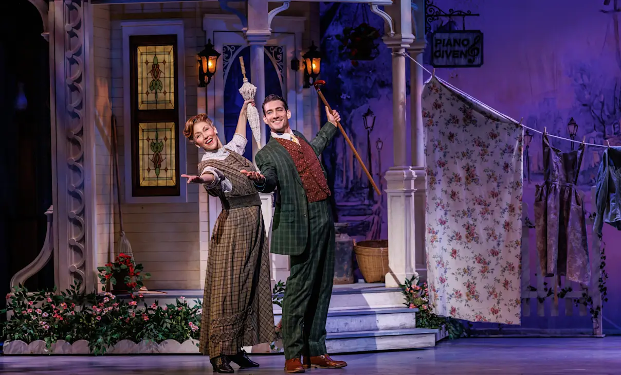 Music Man company in roles of Mrs. Paroo and Harold Hill. Photo by Marshall Meadows.
