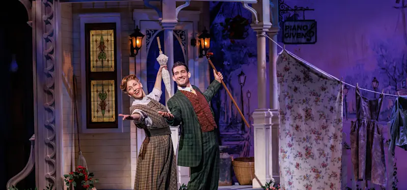 Music Man company in roles of Mrs. Paroo and Harold Hill. Photo by Marshall Meadows.