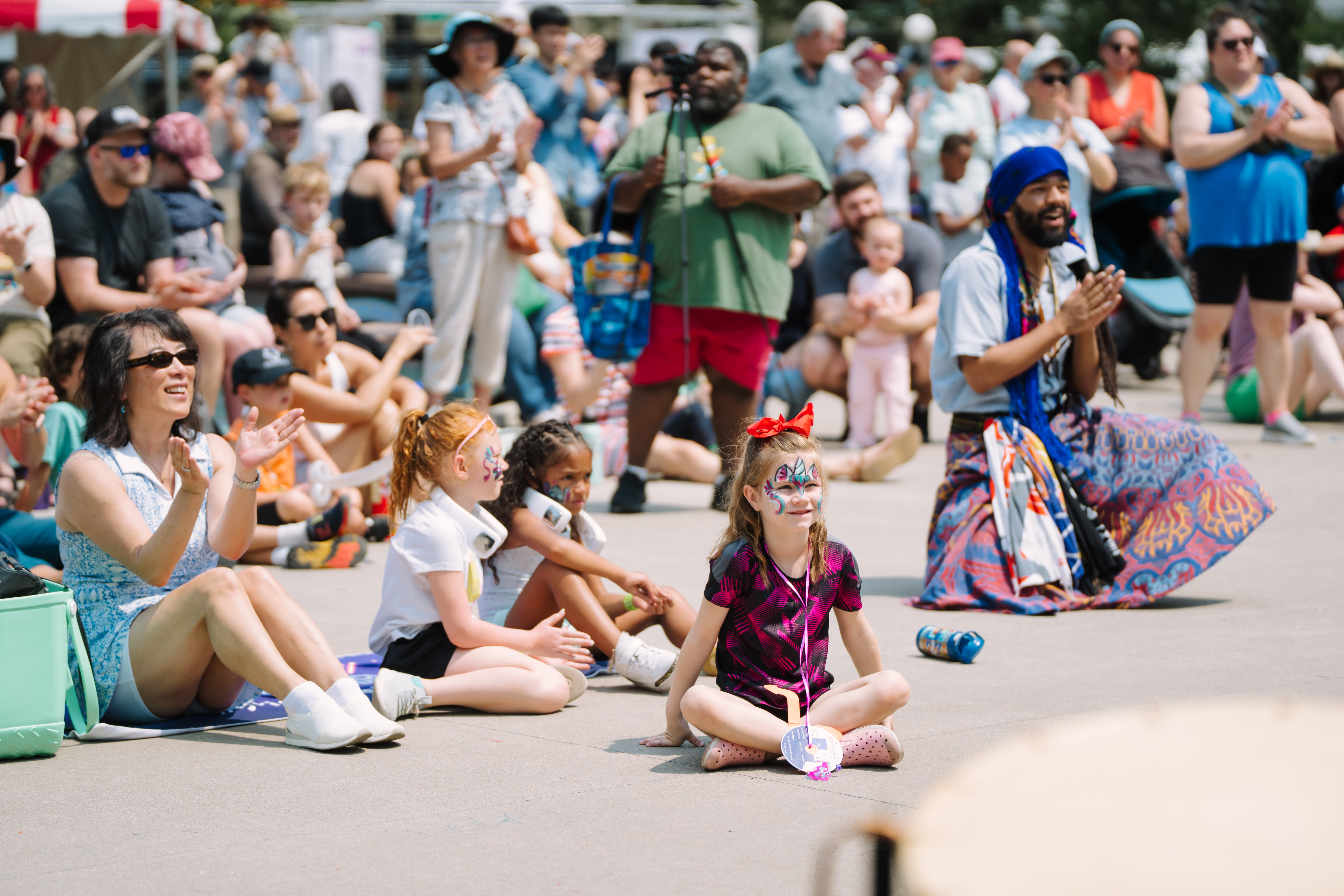 Audience at an outdoor performance during the Flint Hills Family Festival 2025. Photo by Laura Alpizar.