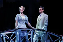 The Music Man company in roles of Marian Paroo and Harold Hill. Photo by Marshall Meadows.
